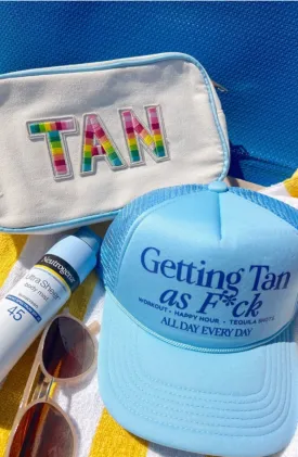 Getting Tan Blue Trucker Hat